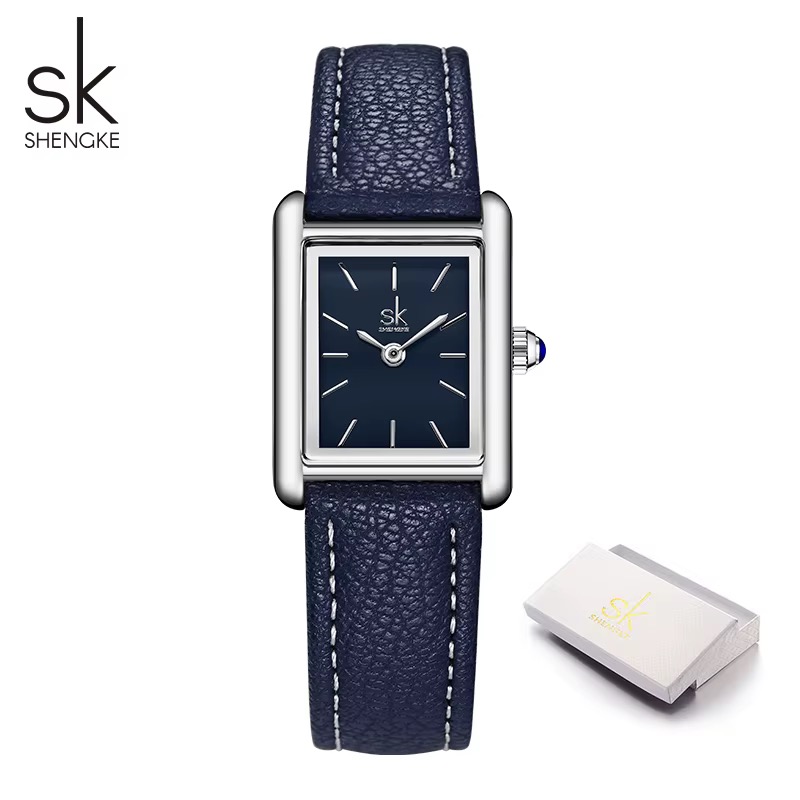 Montre SHENGKE rectangulaire femme, cadran bleu marine, bracelet bleu marine surpiqué, couronne à cabochon bleu