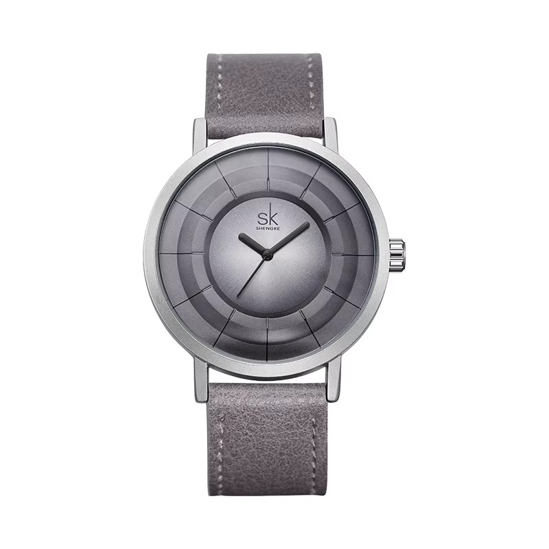 Montre SHENGKE au cadran en relief à plusieurs niveaux, boîtier argenté, cadran gris, bracelet gris