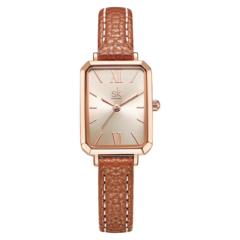 Montre femme SHENGKE rectangulaire, boîtier ton or rose, cadran champagne à chiffres romains, bracelet camel