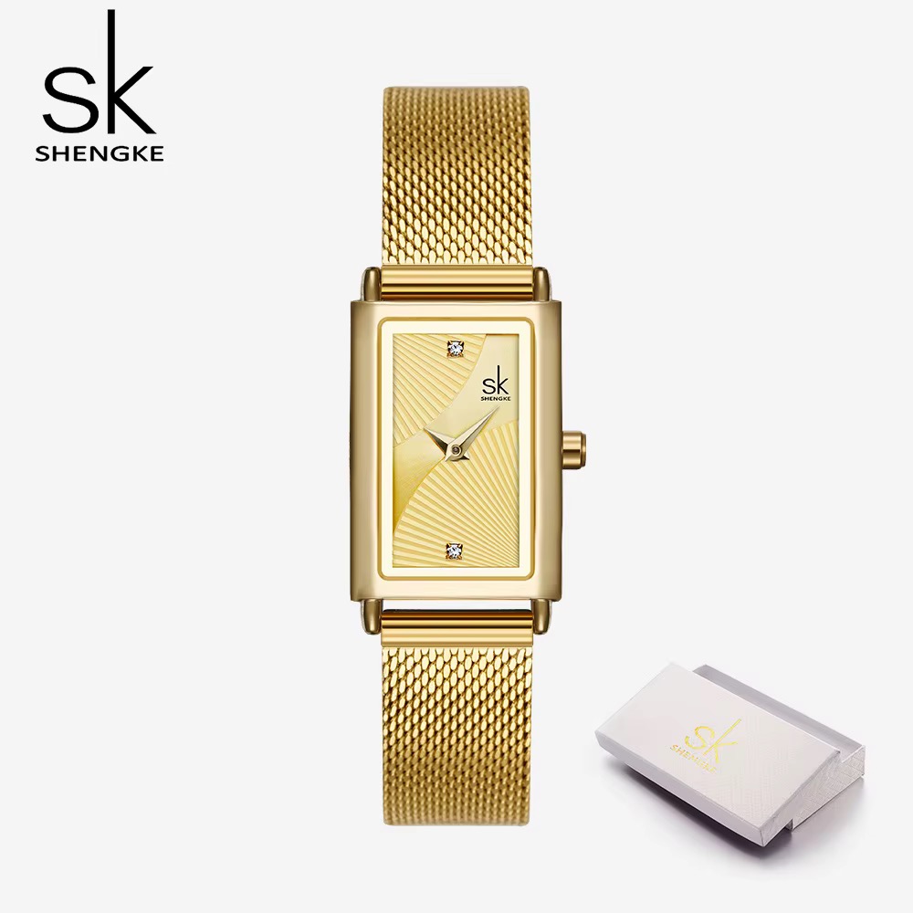 Montre femme SHENGKE rectangulaire dorée, cadran doré à motif rayonnant, bracelet maille dorée