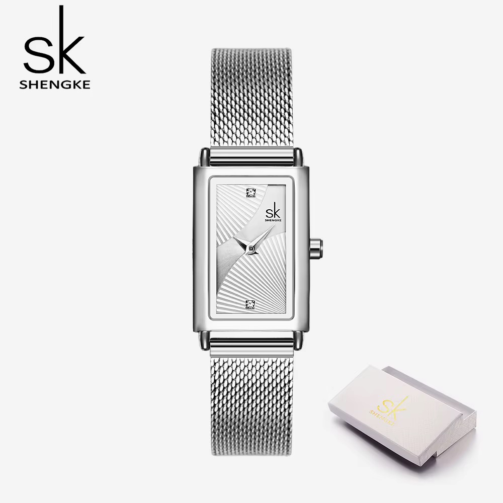 Montre femme SHENGKE rectangulaire argentée, cadran blanc à motif rayonnant, bracelet maille argentée